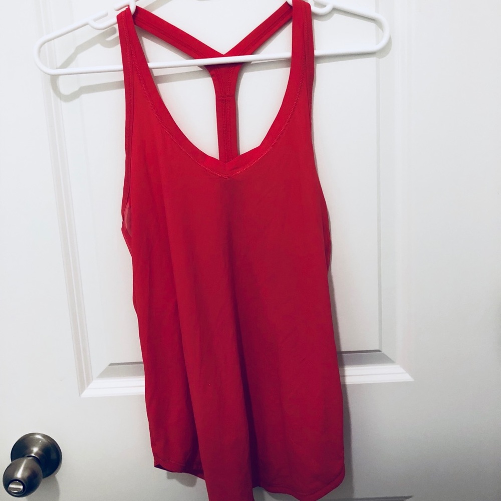 Lululemon bright pink tank.